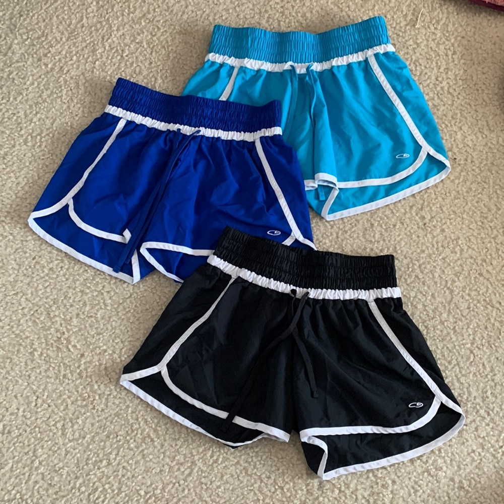 Three pairs of champion athletic shorts